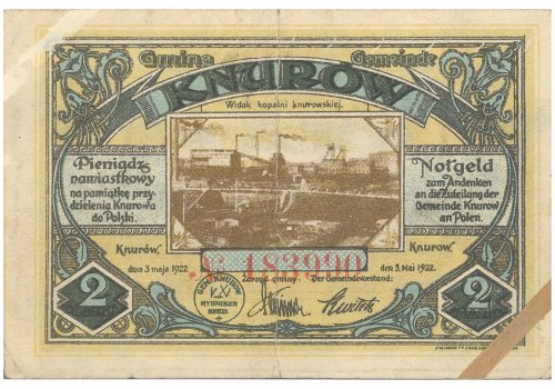Numer inwentarzowy: MŻo/401; Wymiary: Szerokość - 9,5 cm; Wysokość - 6,5 cm; Materiał: papier; Technika: drukarska; Pochodzenie: brak danych; Datowanie: 1922 r. 
Banknot zastępczy o nominale 2 marek wydany dla gminy Knur&oacute;w 3 maja 1922 r., ważny do 03 maja 1923r. Banknot wydany&nbsp;na pamiątkę przydzielenia Knurowa do Polski. Na awersie widok kopalni knurowskiej. Na rewersie podpis do zdjęcia o treści:&nbsp;&bdquo; Miejsce kaplicy na cmentarzu w Gliwicach, w kt&oacute;rej przez wybuch podminowanej broni utraciło 15 żołnierzy francuskich życie&rdquo;.